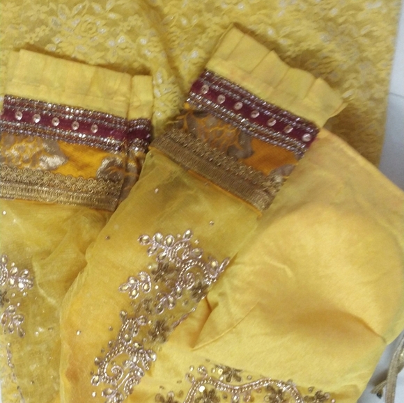 Beautiful haldi colour net shimmer saree with designer blouse - Picture 4 of 5